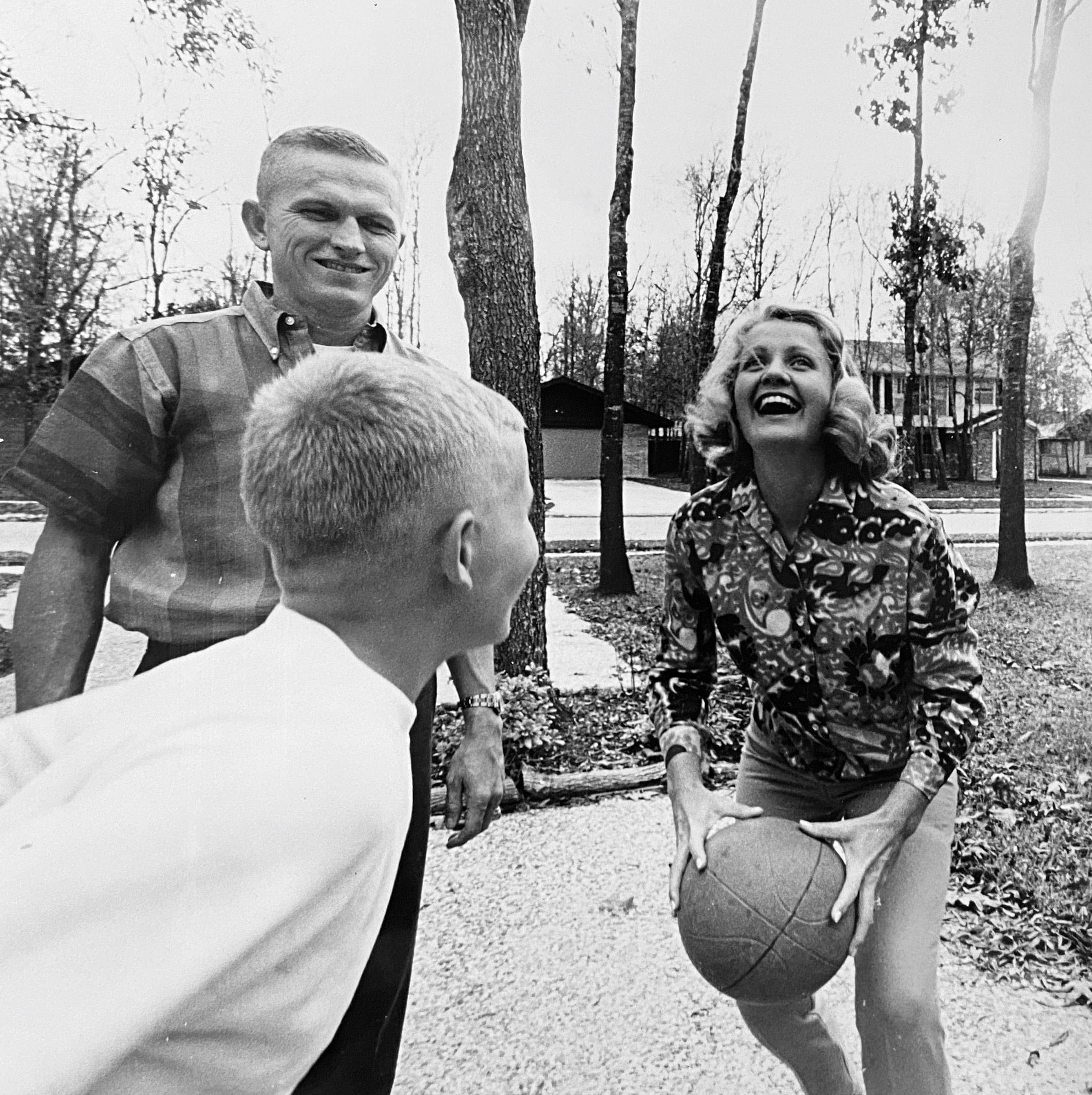 Frank on a rare day off, playing basketball with Susan and Edwin at their home in Houston.